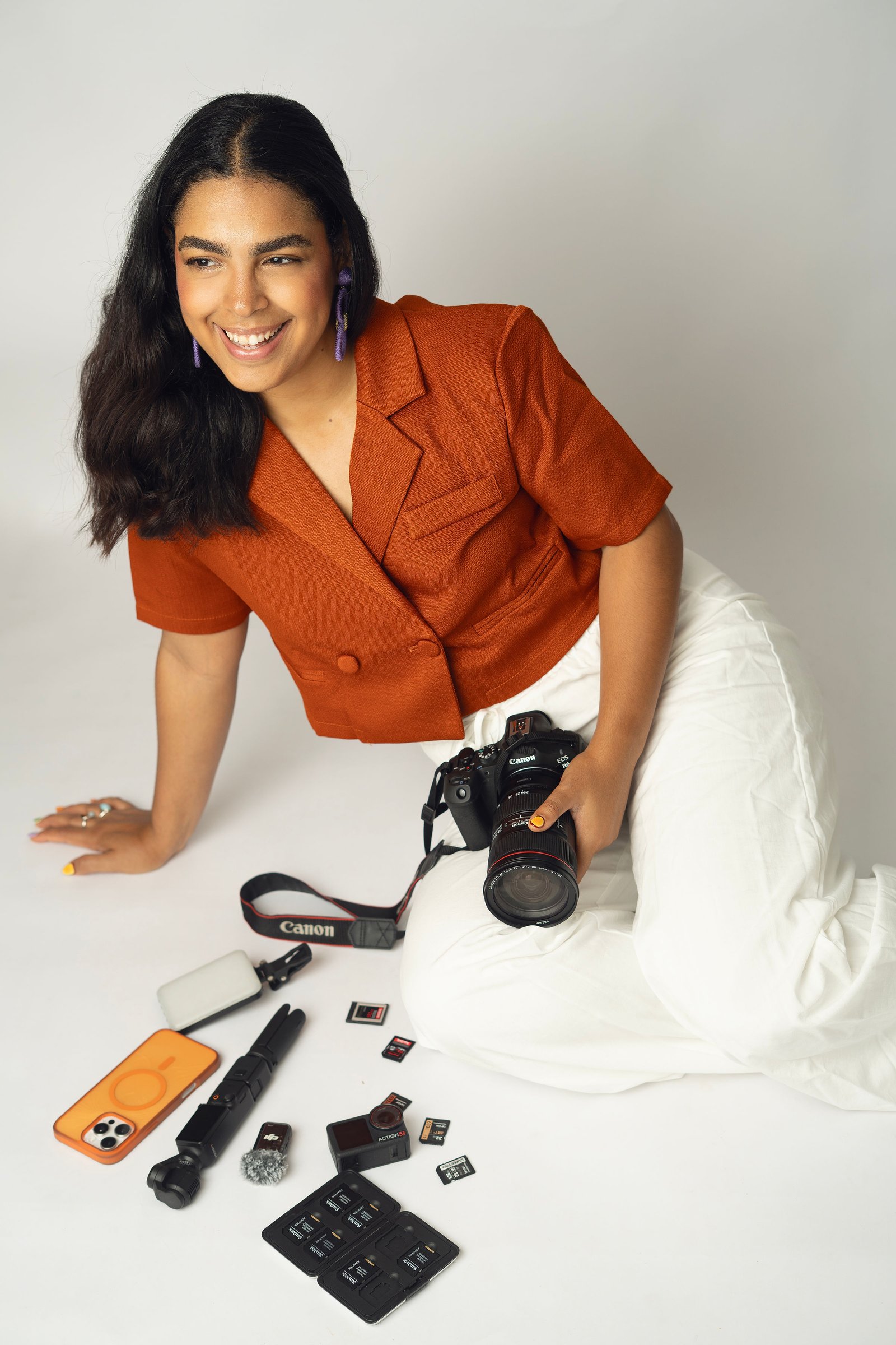 Diana Guillén holding her camera